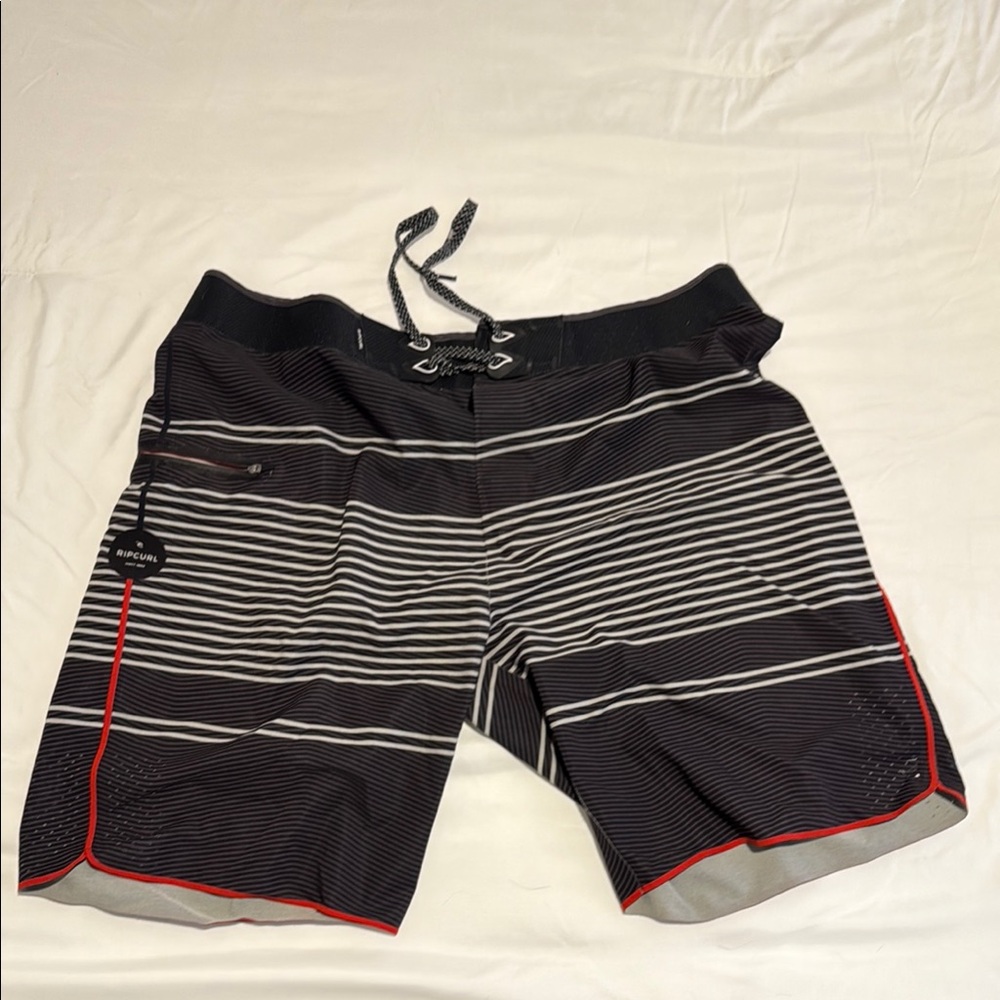 Rip Curl Black and White Board Shorts with Stripes gently used smoke free home